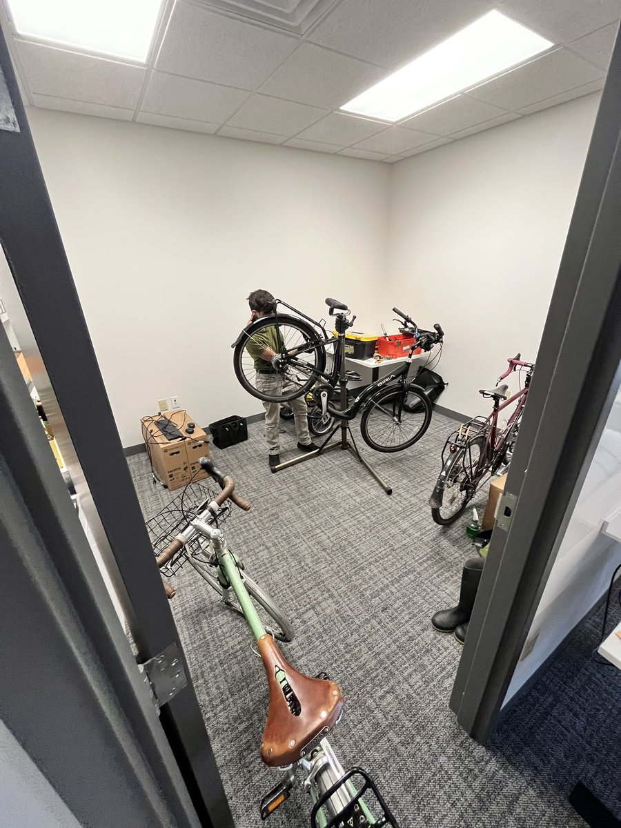 It’s bike tune up day in the Pittsburgh office! Does <a href="/tooledesign/">Toole Design</a> subsidize car parking? ❌ Do we pay for transit passes and in-office bike tune ups? ✅