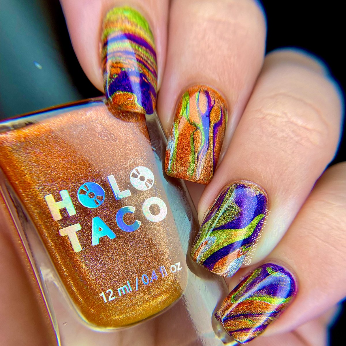 madlacquer's tweet photo. Excuse the double tweet 😅

Entering this mani for #holotacoholoween2022 https://t.co/dgxbFzSXDh