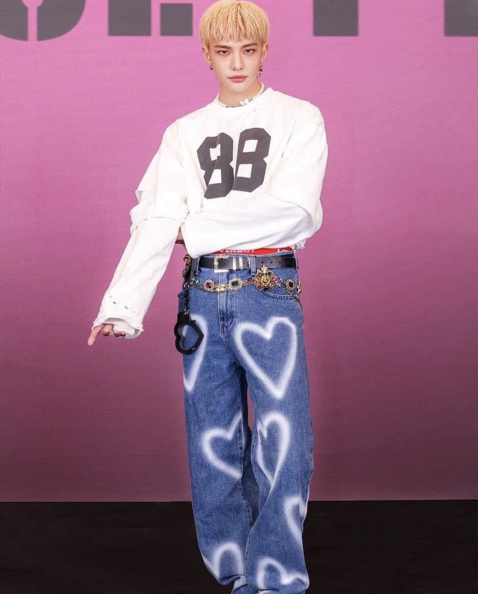 SourpuffShop's tweet photo. Not to be biased or anything but we are absolutely LIVING for Hyunjin from Stray Kids fit 😍. Heart Burst Jeans available on our website with limited stock! 🫶💕 #Case143 https://t.co/EAU0MjS6IC