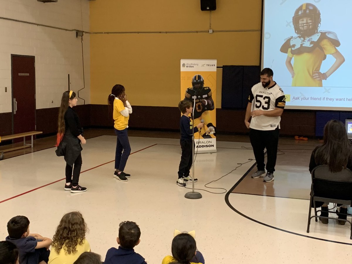 camaceschool's tweet photo. Tiger Cat Anti-Cyberbullying Day!!  Students were provided with a great message about online safety and an awesome visit with two Hamilton Tiger Cats: Bralon Addison #0 and Alex Fontana #53 sponsored by Telus. #endbullying @HWCDSB @MadalenaJohn @Ticats https://t.co/UzsvIJM5Zg