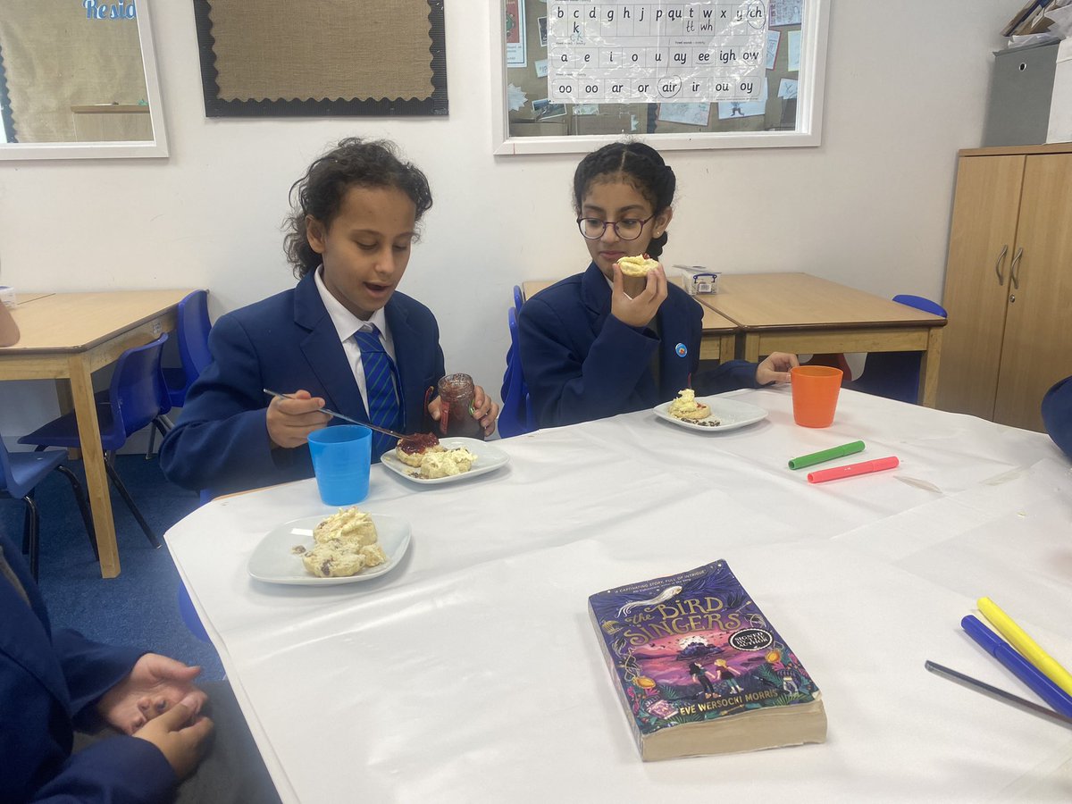 GDonaldsonREMAT's tweet photo. A lovely reading club with these girls @stsilasschool this afternoon! We enjoyed some tasty scones with jam and clotted cream as we discovered (whilst reading) that they had never tasted them before! We’ve just reached the end of chapter 8 @MzEvieMo…eek! 🫣😬 https://t.co/sX33jdpzX2