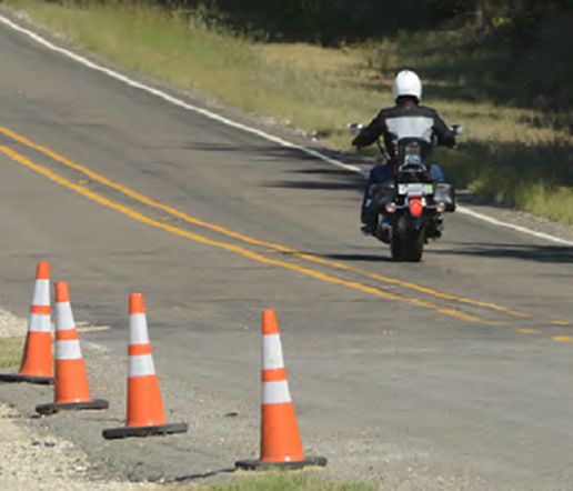 LookLearnLive's tweet photo. Work zones are hazardous for motorcycle riders. When you see the orange signs:   

-Reduce speed and lean.   
-Focus on the safest path.  
-Increase your safety margin.   
-Protect your eyes. If your helmet shield is up, put it down! 

#RiderTips https://t.co/HMcrTeDfOj