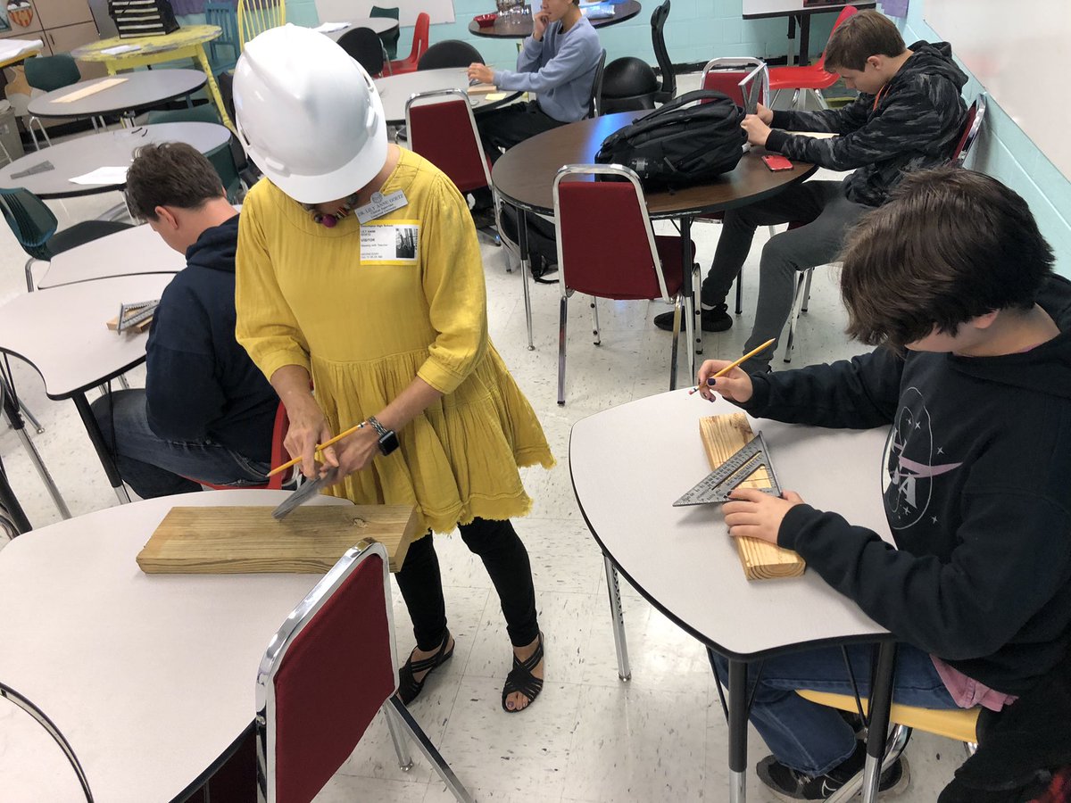 SraExumGHS's tweet photo. Workplace Spanish students taught their visitor, Longwood Spanish Professor Emeritus, Dr. Goetz, how to use the escuadra rápida en español! #bold #authentic #handsonlearning #sointimidating @GHSCollier https://t.co/X7UFVjczfK