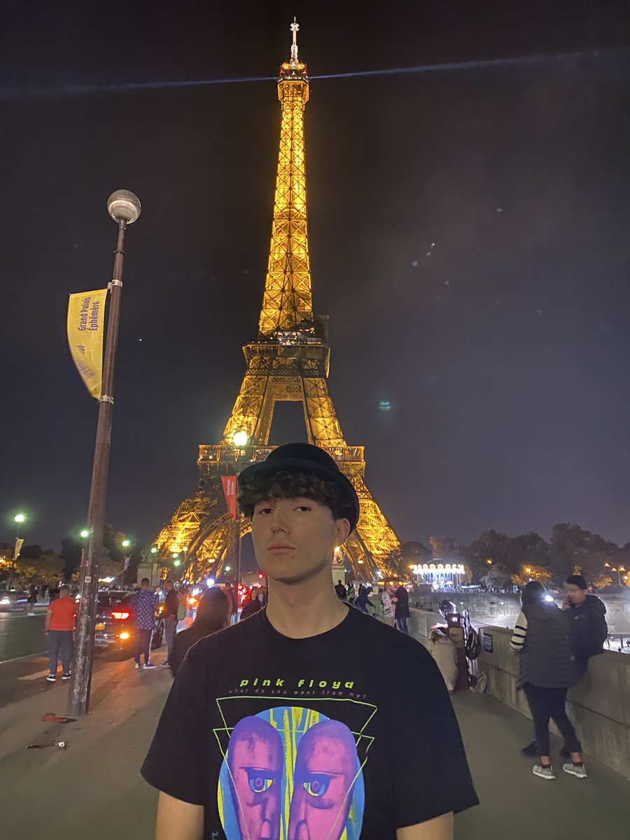 AlexDaspit's tweet photo. Them: he will never take pictures with the Eiffel Tower lit up at night while wearing the bowler hat made famous by Bowler Hat Tuesdays

Me: https://t.co/S1m6jFsQJ2