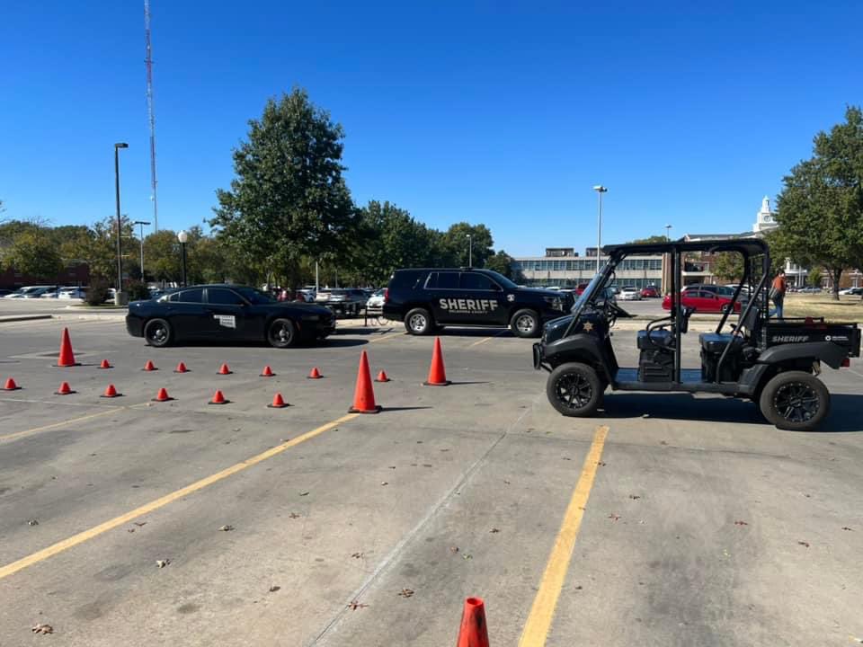 OHPDPS's tweet photo. “Scared Sober October” at @RogersStateU today. Sgt. Eric Kirby with @OkCountySheriff joined Trooper Zach Woods #741, Trooper Russell Callicoat #296 and LT Chris Arnall #165 in taking the drunk driving simulator out for students as part of our #ENDUI program with @OkHighwaySafety. https://t.co/OFyssrNtO9