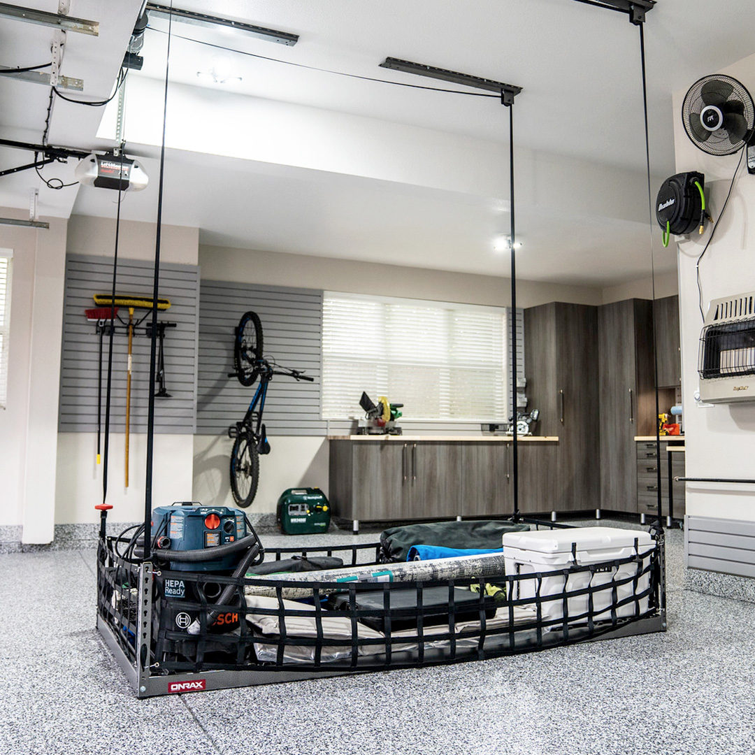 tailoredcloset's tweet photo. Clear the clutter with #OverheadStorage! Big items like kayaks or seasonal decorations can be safely placed away with this feature. This type of storage allows you to free up space, leaving you with more room to maximize the potential of the garage. ➡️ https://t.co/Hfyhm9UBqa https://t.co/tMHmKsZyOg