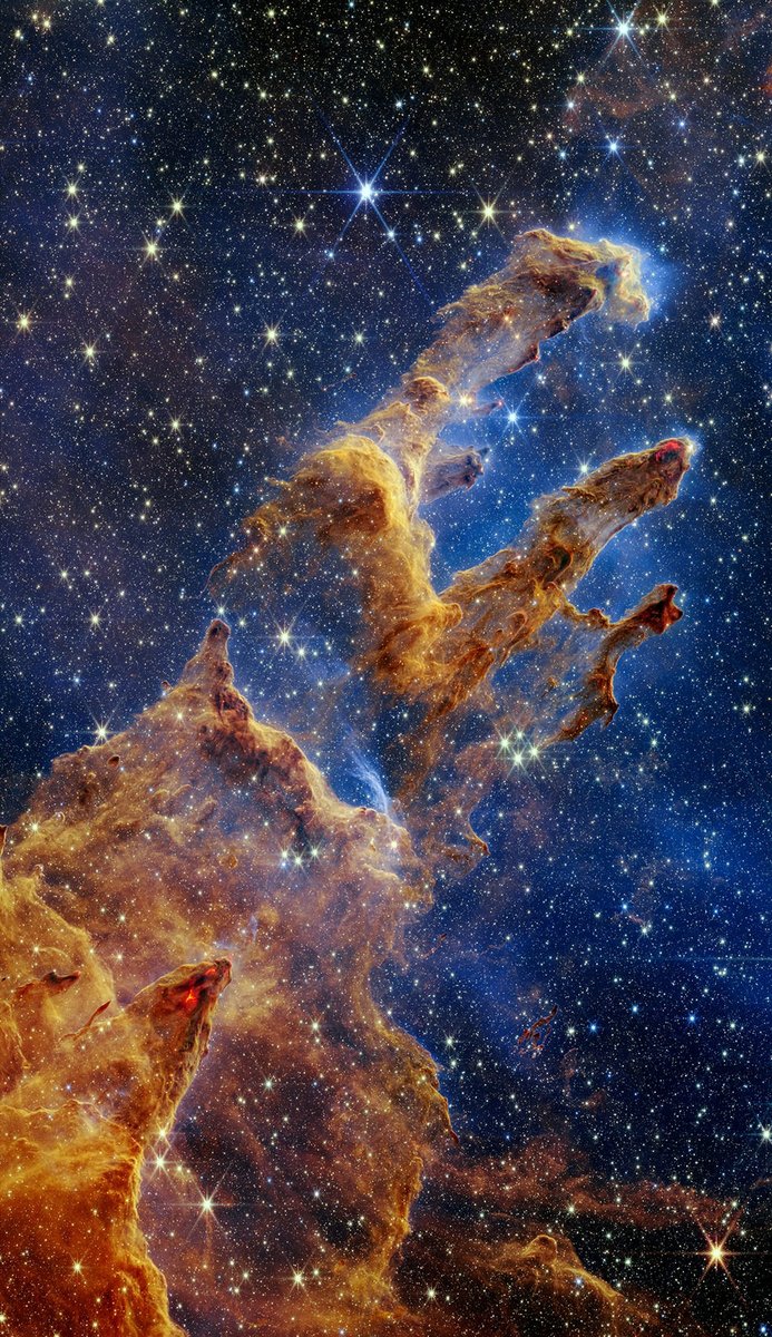 WIRED's tweet photo. First made famous by NASA's Hubble Space Telescope in 1995, NASA's James Webb Space Telescope revisited this iconic part of the Eagle Nebula called the Pillars of Creation. The latest image reveals new details and hidden stars.

📸: NASA https://t.co/Zp6gSC4EBn