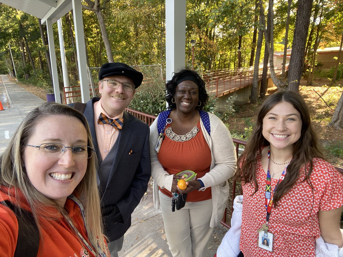 Walczak_Math's tweet photo. #UnityDay @eastcarymiddle #SignLanguageClub Waiting for students to get picked up from our club meetings today and found a sea of orange for unity day @slbless @SmithSciECMMS https://t.co/Qi8o5ioZqj