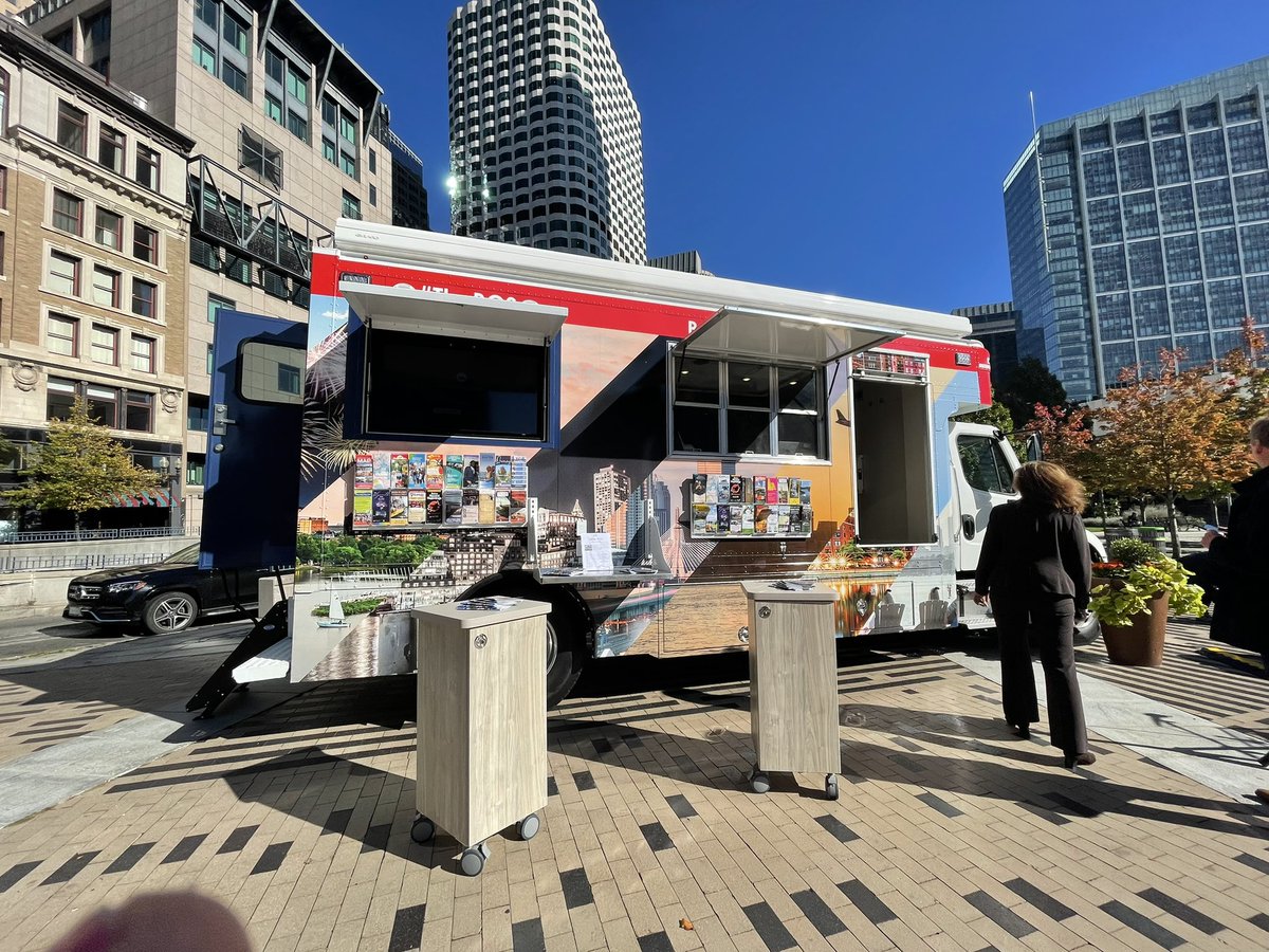 KimTunnicliffe1's tweet photo. Staff at the Greater Boston Convention & Visitors Bureau cut the ribbon for the newest member of their team, fondly called #TheBOS. The mobile visitors information center van will travel to all neighborhoods in @CityOfBoston, extending the #GBCVB’s reach. https://t.co/8gHgl4I2cL