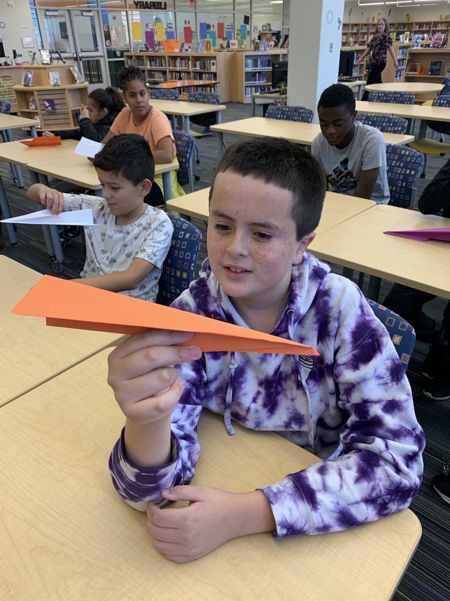 MrsBerned's tweet photo. ECS Tigers are doing science experiments to learn about the scientific method.  We visited the library to make paper airplanes out of copy paper and construction paper.  We then flew them to see which ones flew the farthest!  @theBendLibrary  @n2yllc  @WCPSS_SES @RBMS_Principal https://t.co/xiIKzhpBtx