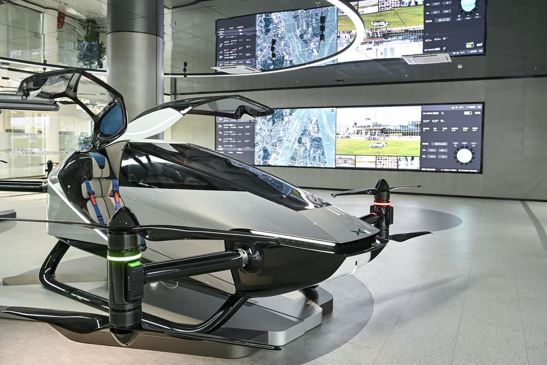 Carsnationn's tweet photo. A flying car was on display on Monday in Guangzhou, south China’s Guangdong. Boasting multiple functions such as autopilot, radar ranging and obstacle avoiding, the car has a maximum flight altitude of 1,000 meters and a maximum flight speed of 130 kilometers per hour. https://t.co/0YnoSyylVt
