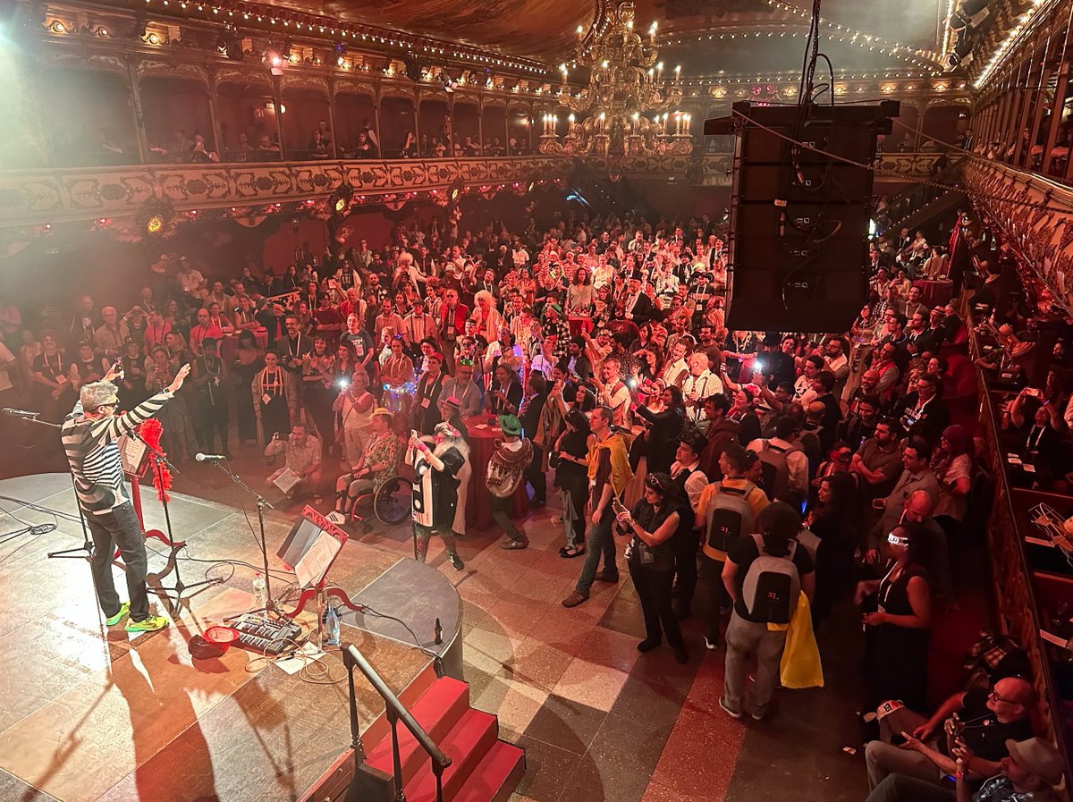 Just a quick photo from the Global Moodle Moot held in Barcelona last month (great time by the way). Here is <a href="/moodler/">🎓 Martin Dougiamas</a> welcoming everyone to the "time warp" ball. 
#globalmoot23 #moodle