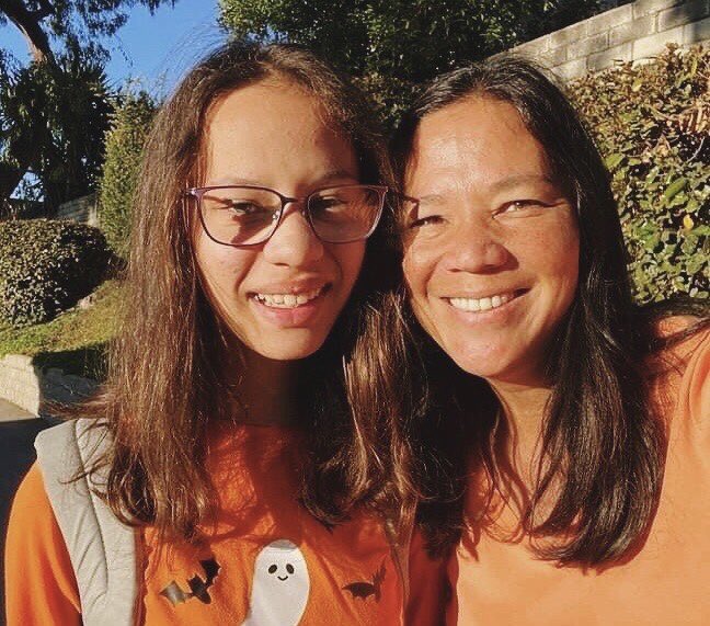 thriveconejo's tweet photo. This awesome mother/daughter duo shares smiles and wears orange for kindness, acceptance and inclusion on #UnityDay2022! 🧡🧡 #CVUSDUnityDay https://t.co/ptRwdOUpiv