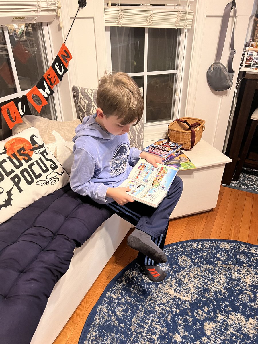 VTGRAD2X's tweet photo. @MillerLibrarian @CburgESCoyotes @mcps_va @mcpsvalibraries My youngest Coyote has been reading his new graphic novel all evening ❤️📖 thanks for the opportunity to volunteer at the book fair this week. It was so much fun to see all the excitement of the kids! #appreciateallyoudo https://t.co/YN3MWqfUms