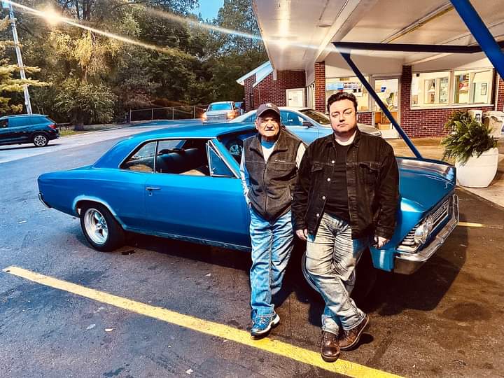 Last Tuesday I took my Pop’s sweet girl, his ‘66 Malibu, out for the last time this year. Olympic Broil has car shows through the summer and into fall and I wanted to get her out one last time.
I picked up our old family friend, John Richards (“Hawk”), and we cruised for my Pops.