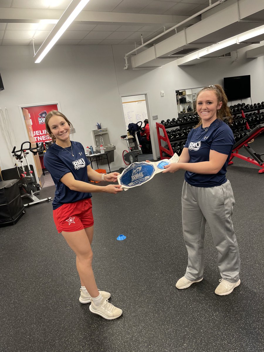 RMUSoftball's tweet photo. #ANDNEW 

@juliaehrman knocks off @r_rhinehart6 after a fun night in the weight room. 

Who’s coming for that beautiful @UndisputedBelts #ColonialChallenge Championship next?

#CompeteTogether https://t.co/SuQ7J0VlZ1