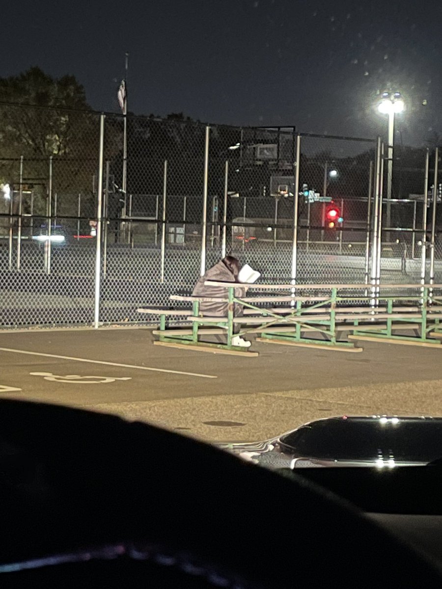 JoshuaFuchs77's tweet photo. Waiting on the other teams bus to arrive after football game and one of our scholars walked across parking lot to sit and use my headlights to read her book. Finding a way! https://t.co/S1bLIdvsa9