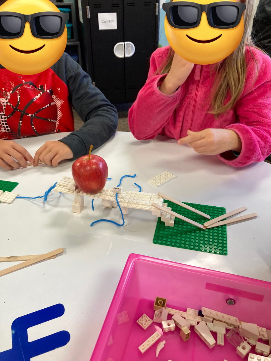 BardonBann's tweet photo. STEAM is so fun with 1st grade Ss! 1st grade learning how to collaborate in a small group building a bridge strong enough to hold an apple using legos, strings and popsicle sticks @BriarcliffES https://t.co/DcvBlNXGC3