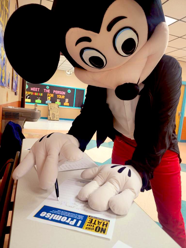JonFlores_EP's tweet photo. BCE is truly the happiest place on earth! Thank you Mickey & Minnie for stopping by to make our kids day more cheerful! They stopped at our Bond 2022 table and signed our NPFH pledge. #DreamBelieveAchieve #FallConferences https://t.co/tiP5vMZNO2