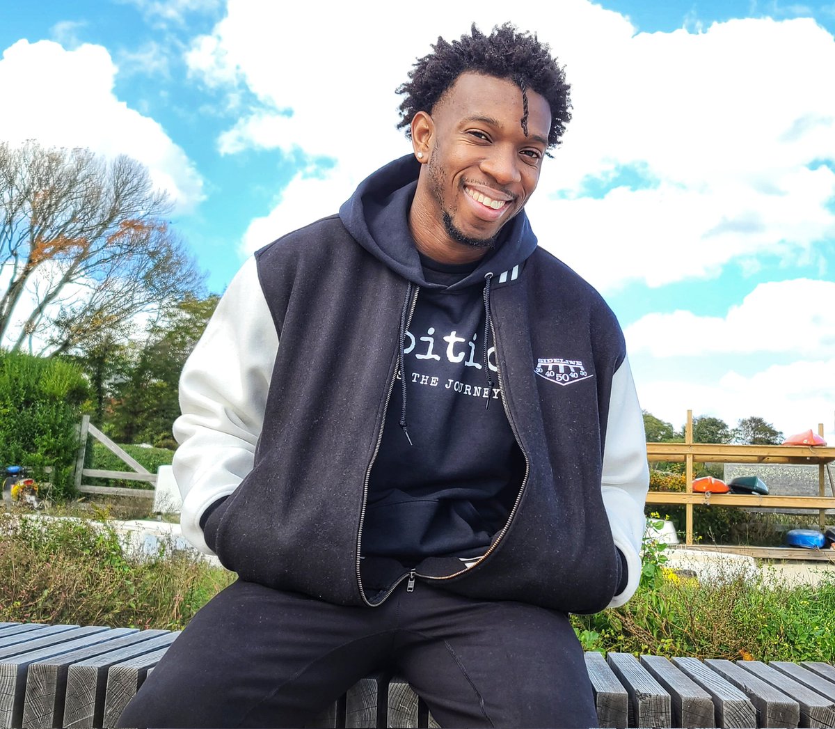 sidelinebrand's tweet photo. We decided to layer the Sideline Varsity Jacket and Black Ambition Hoodie to catch this cool Fall 🍂 breeze today. 👏🏿 #ambitionfuelsthejourney https://t.co/kpNctDom3Y