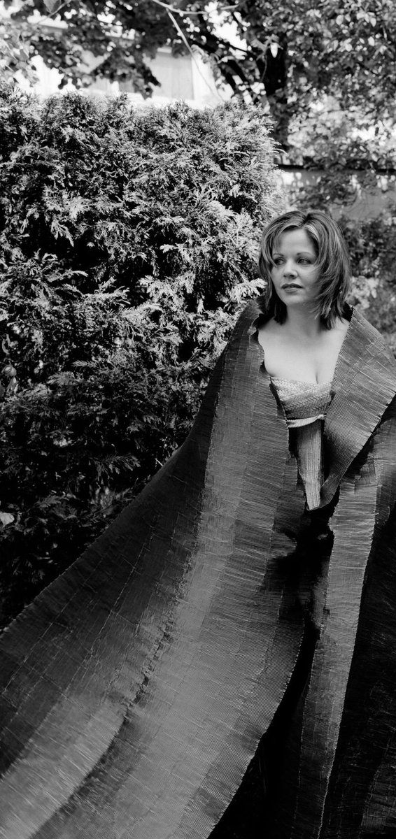 Soprano singer Renee Fleming wearing Issey Miyake shot by John Stoddart. 1999.