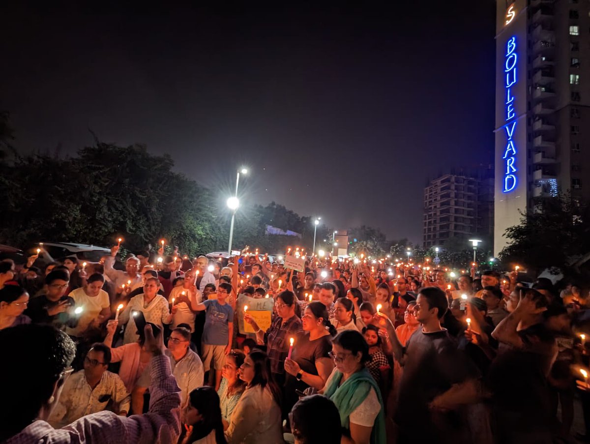 timesofindia's tweet photo. Candle march in Noida over death of infant mauled by stray dog 

Residents of a housing society in #Noida's sector 100 took out a candle protest march on Wednesday night after a one-year-old child was mauled to death by a #straydog at an apartment building in Noida. https://t.co/Qm9pPzYKvg
