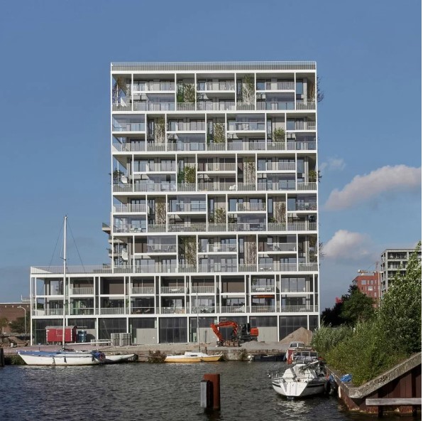 #MykonLoves❤️// Planted balconies surround Stories housing in Amsterdam by Olaf Gipser Architects.

Learn more: shorturl.at/aknM5

#Dezeen #mykon #sustainablearchitecture #architecture