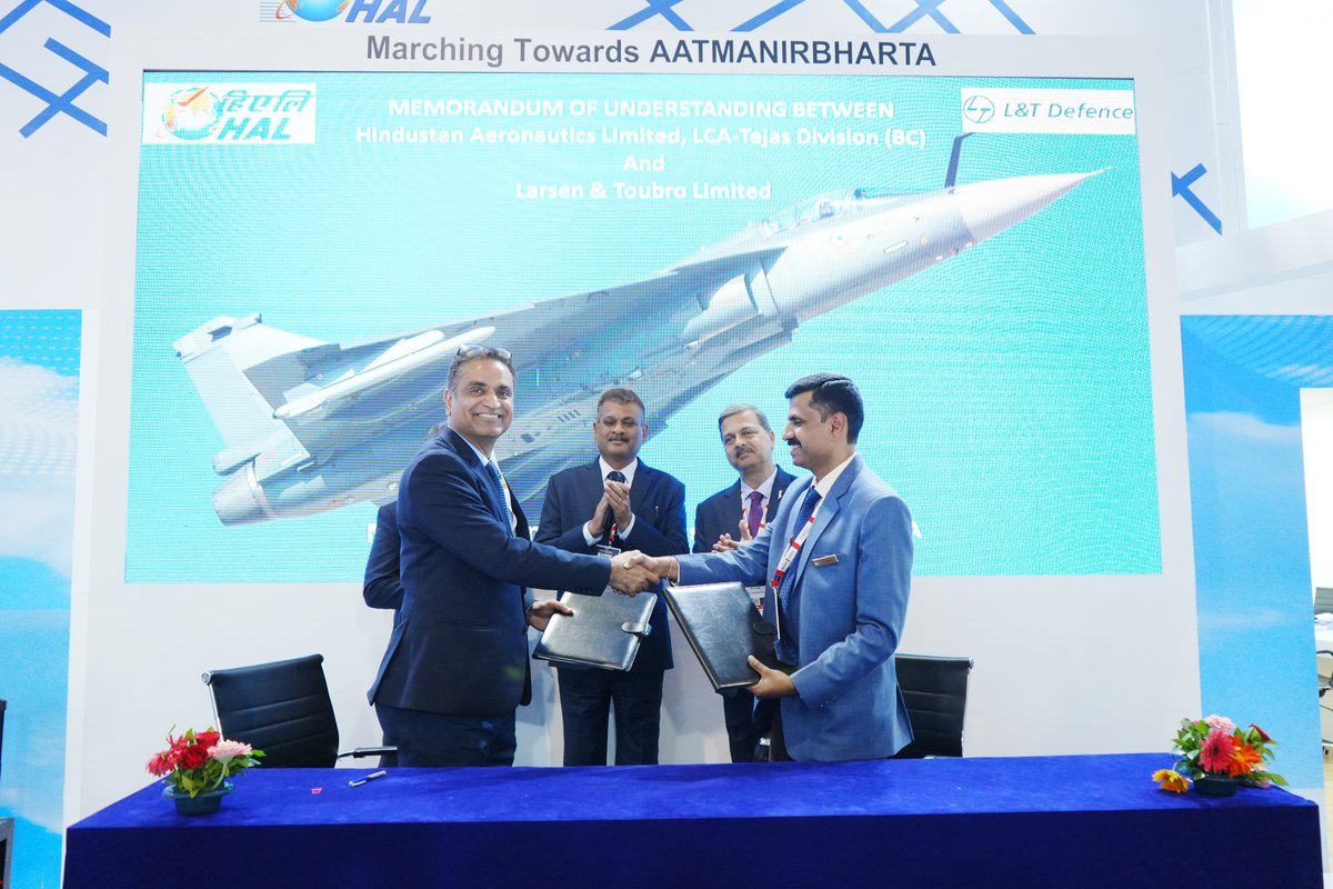 HALHQBLR's tweet photo. HAL’s LCA Tejas Division signed an MoU with Larsen &amp; Toubro Ltd. on October 19, 2022 during Defexpo 2022 at Gandhinagar for manufacturing 22 sets of Wing Assembly for LCA Tejas MK1A. https://t.co/4G1unJvU0l