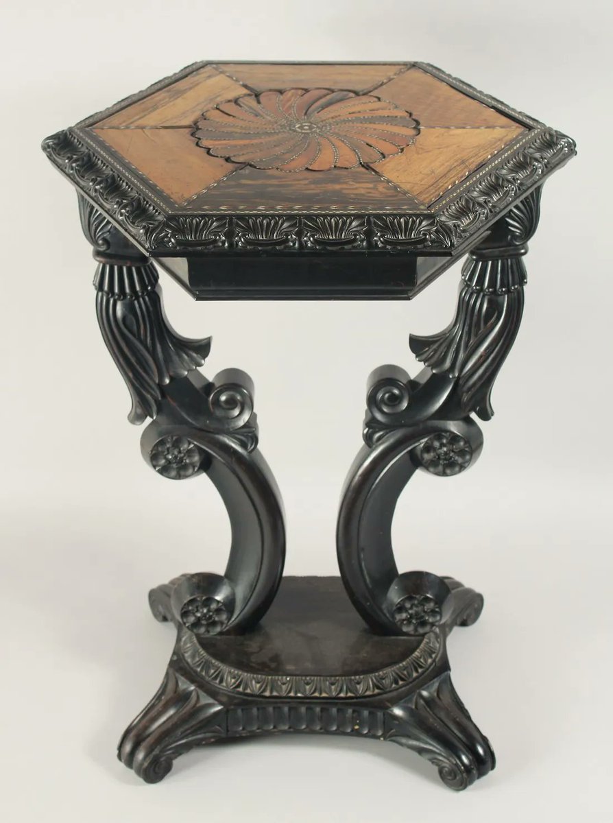 JNAuctioneers's tweet photo. A 19th century #Ceylonese ebony and specimen wood octagonal #table, the top inlaid with #satinwood, #rosewood, #calamander and bone, the frieze with single drawer, 72cm high, 54cm wide. Islamic and Oriental 27 October. Estimate: £1500-2000 @JNAuctioneers https://t.co/hiqVaSC1o5