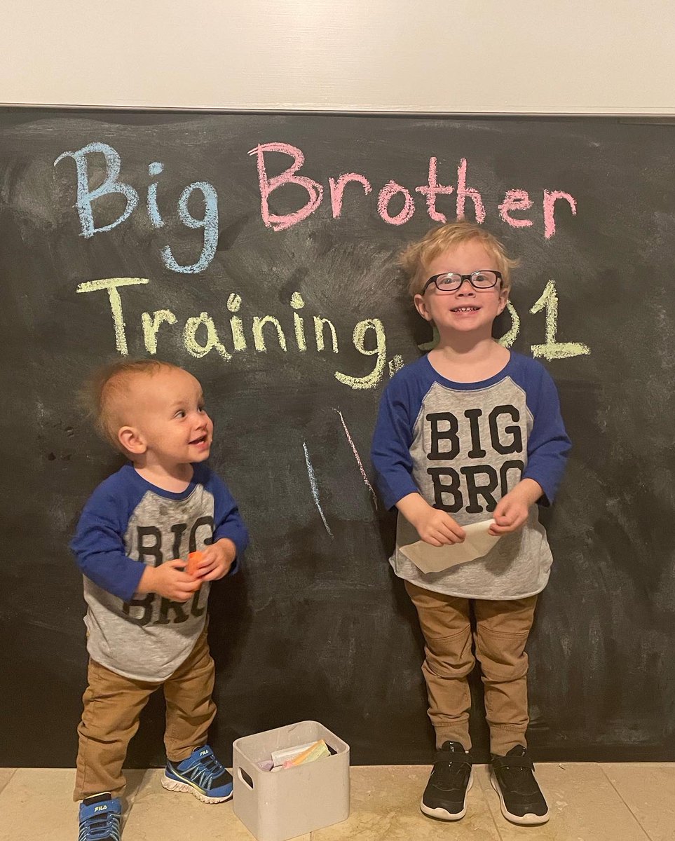 coachlsullivan's tweet photo. Surprise!!! Sullivan Party of FIVE coming in late May/early June! 

Tate is getting Luke ready for the big brother role. Yes there is a baby in the picture, they both just chose to hold it backwards! 😂 https://t.co/aJdb7lAReO