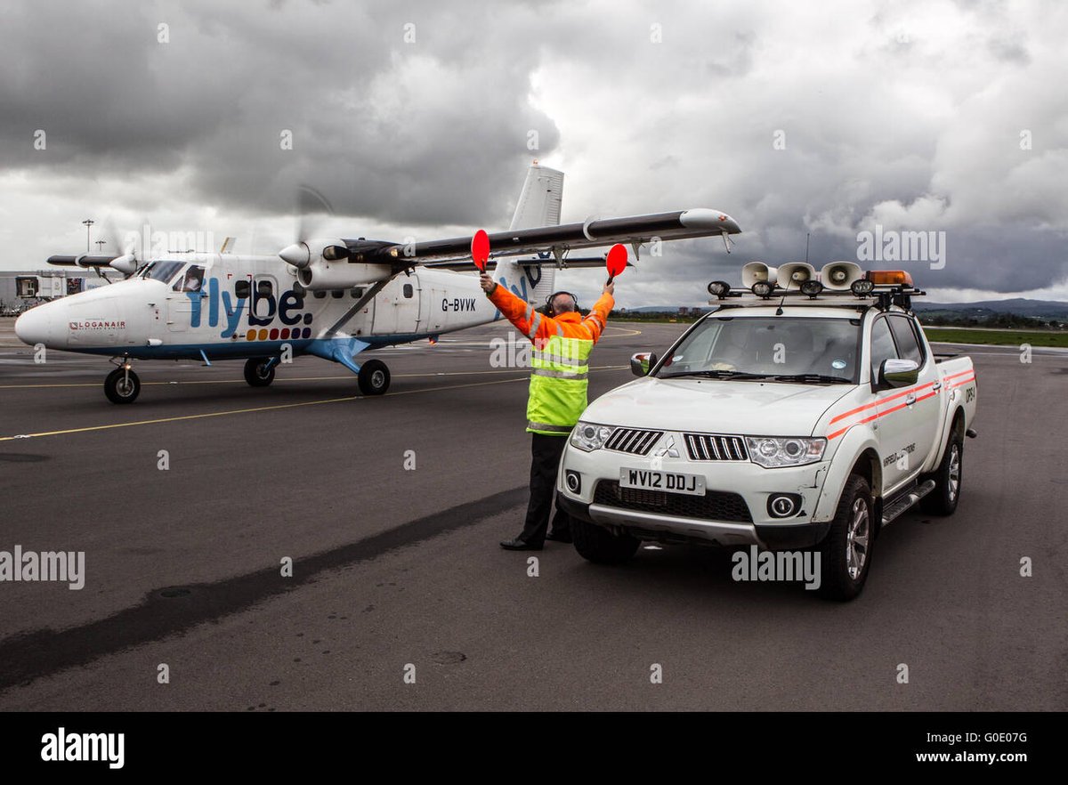 NATS's tweet image. Coming in fast at number 4, we have a classic 'it's those people with the batons' pic. 

Nope. 

Those lovely people are Aircraft Marshals 

#IDATC #ATCDay
