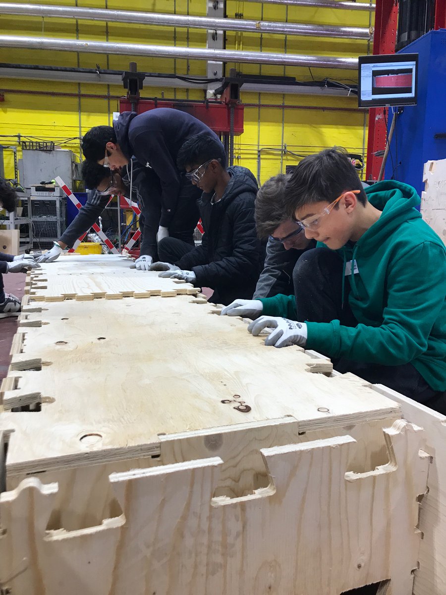 EDTScotland's tweet photo. Great afternoon in the testing lab, fabricating a timber beam - then testing how much weight it can carry! Thank you to @UoE_CivilEng - the students had a great time! #RoutesIntoSTEM #industrialcadets https://t.co/OJabXxMLMj