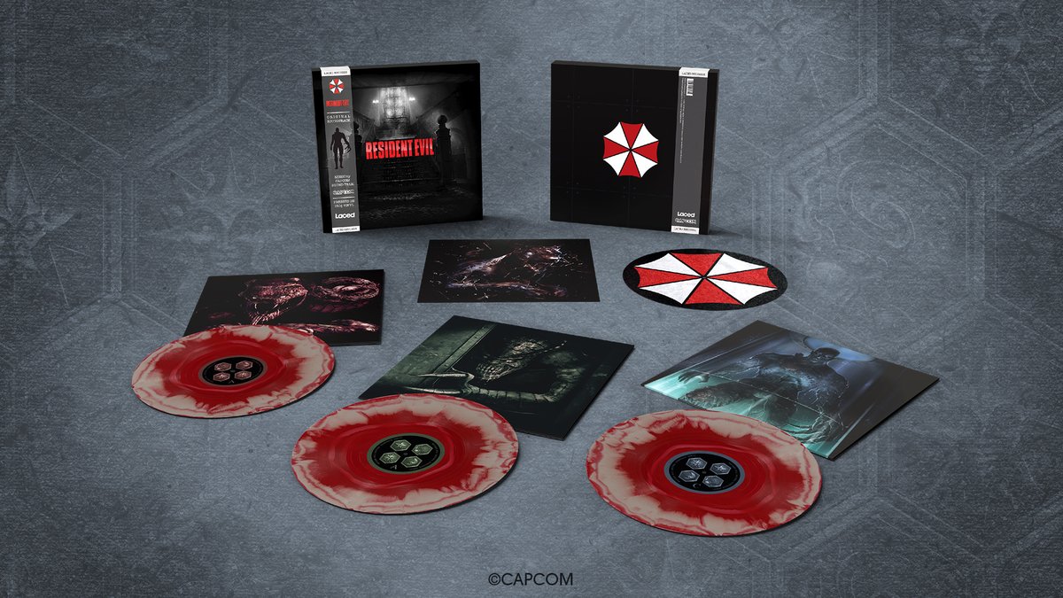 The Resident Evil 1996 Limited Edition vinyl box set laid out with red discs and artwork showing monsters from the game.