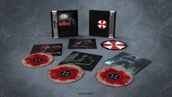 The Resident Evil 1996 Limited Edition vinyl box set laid out with red discs and artwork showing monsters from the game.