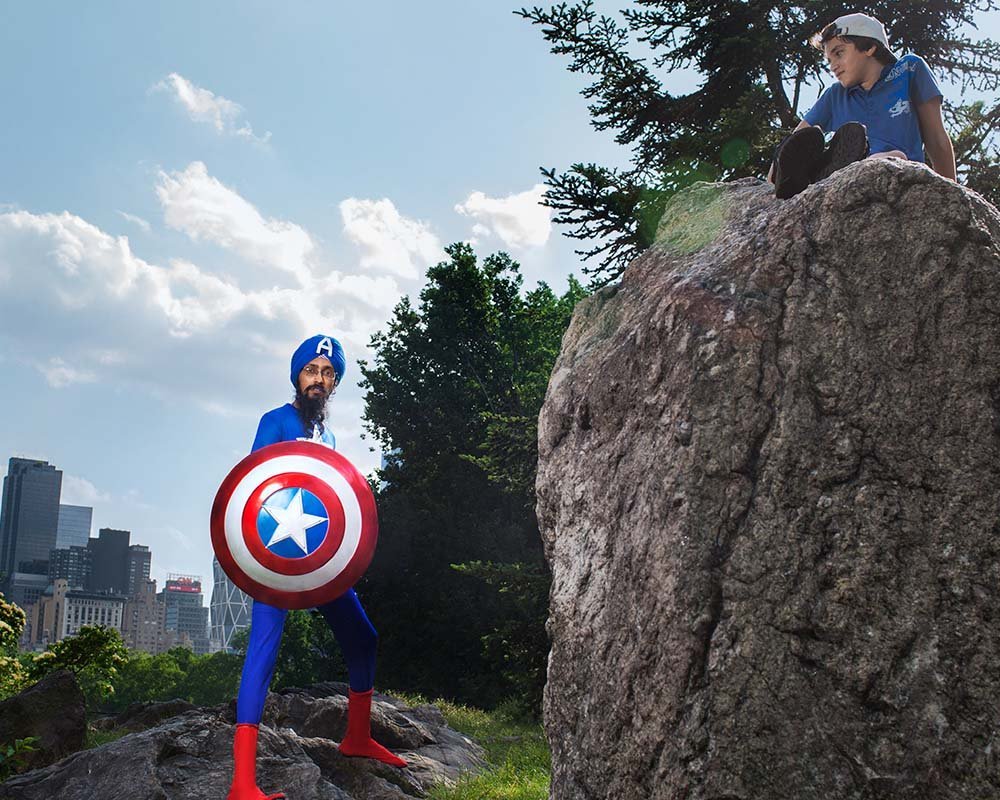 fuzheado's tweet photo. 8/ Sikh cartoonist and activist Vishavjit Singh founded https://t.co/DKjPlmawQQ. The "status quo disruptor" is known for his performance art dressed as Captain Sikh America. More in the #WeAreHereBook by @smithsonianapa @sikhtoons @americansikhflm https://t.co/h84EdbOZyQ