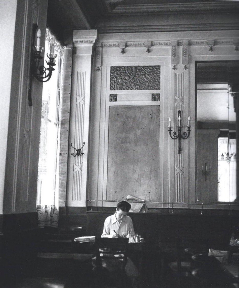 Simone de Beauvoir getting some writing done in peace at Les Deux Magots, Paris, 1944 🖤