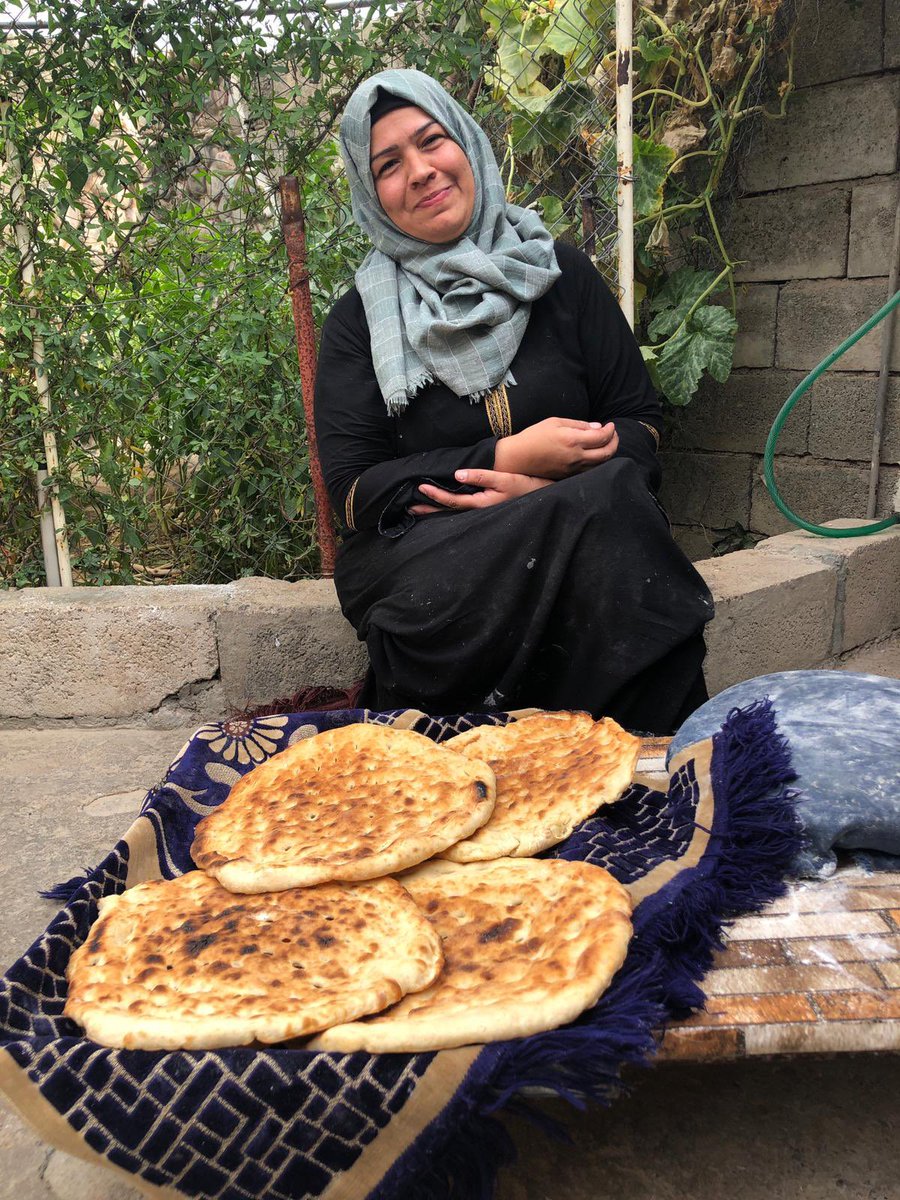 Meet WFWI’s #KRI participant Leila. Leila & her family left #Syria when her village was bombed, lost a son & a daughter, was injured & has a prosthetic leg. Since she graduated in June, she runs her own bread-baking business from her home in #Basrmacamp. #Refugees #Resilience