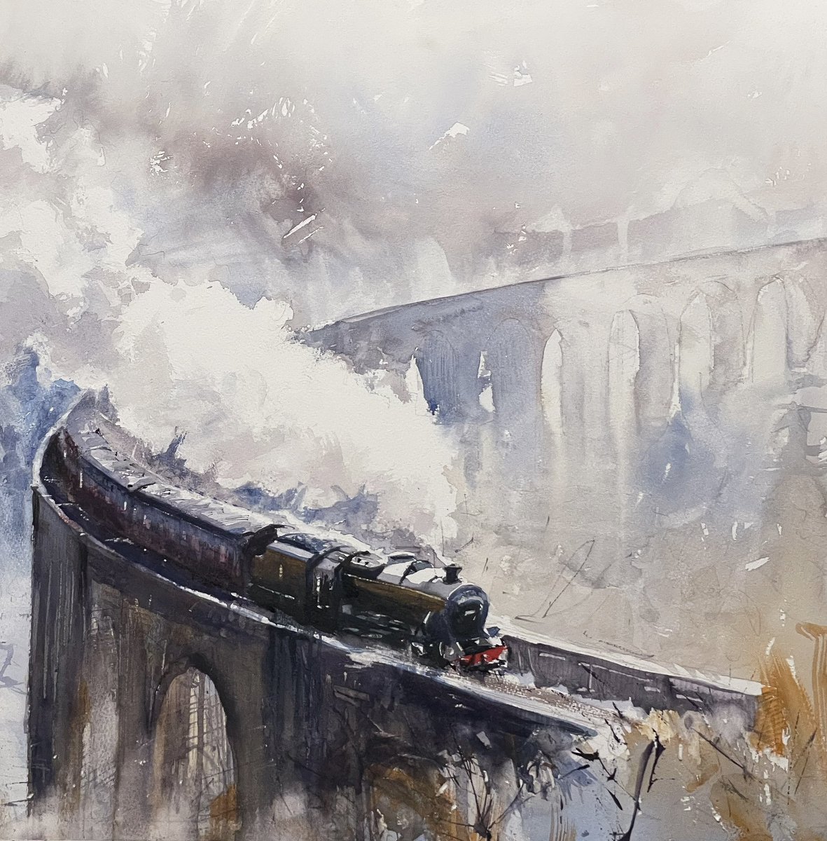 Today’s watercolour, Glenfinnan Viaduct in the Snow. 51 x 51cm on Millford paper using Schmincke watercolours. Painted here plein air twice, but my nephew got the killer train shot reference a few days ago.#glenfinnanviaduct #snow #steam