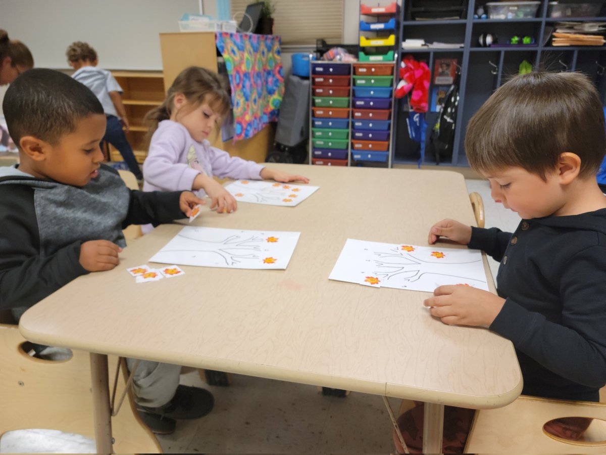 Some of our classroom activities this week included painting with Q-tips to make a fall tree and matching numbered leaves to the numbers on a tree.