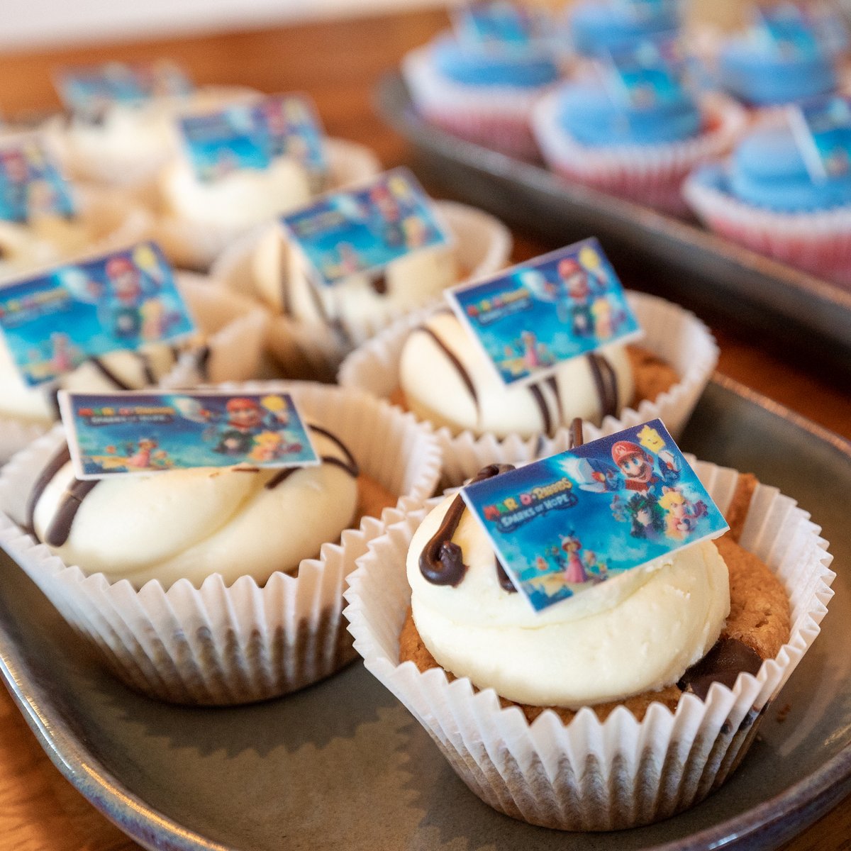 UbisoftSTH's tweet photo. Congrats to @UbisoftMilan and @UbisoftParis from your friends in the north!

The release of #MarioRabbidsSparksofHope is a great excuse for us to order some cupcakes and take a break to play this absolute gem of a game. The reviews are in, it’s a 10/10 from us ✨ https://t.co/Hjg5EK6Wfi