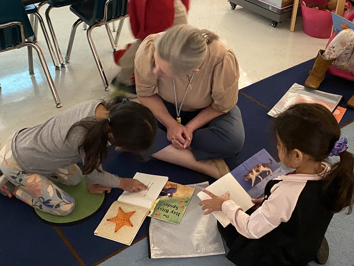 PolandDenise's tweet photo. Kindergartner is working to build stamina during independent reading.  Mrs. King conferences with students to check for understanding and reinforce reading strategies.  #BeGolden #R_FISD #MissionMovingForward https://t.co/6ngoMuvlrS