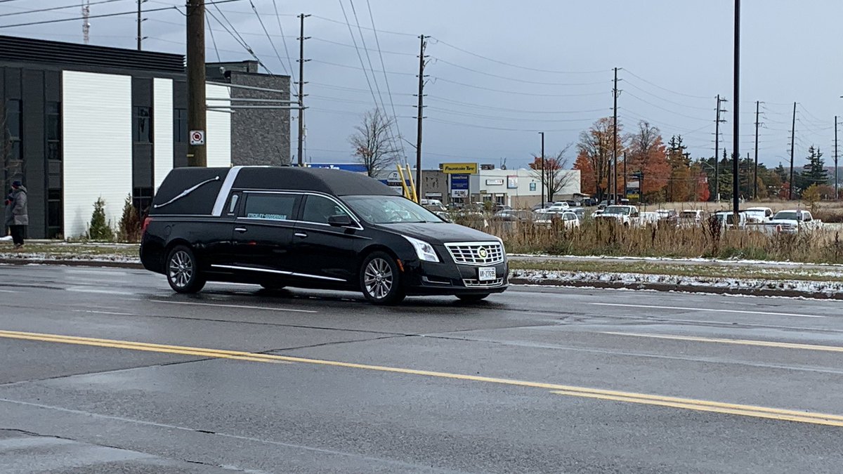 Moving tribute as the funeral cars passed by members of the public on the street