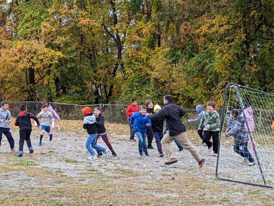 When 2 cafe aides are absent, Dr. Matlosz to the rescue for recess 🏈 ⁦@Principal_UGL⁩ ⁦<a href="/UGLkindkids/">UGL’s Kind Kids</a>⁩