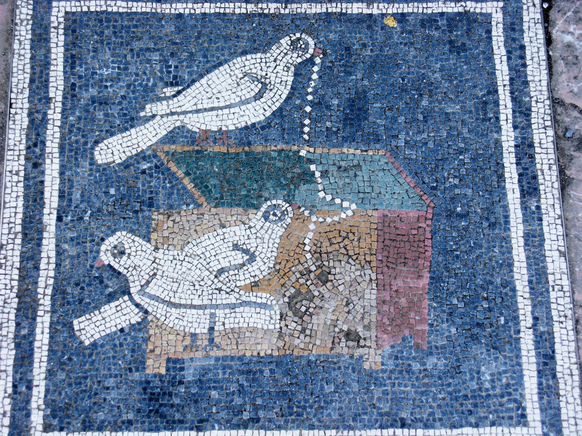 Mosaic floor in Pompeii depicting birds stealing(?) pearls from a jewelry box. Photographer: stocktributor/Adobe Stock.