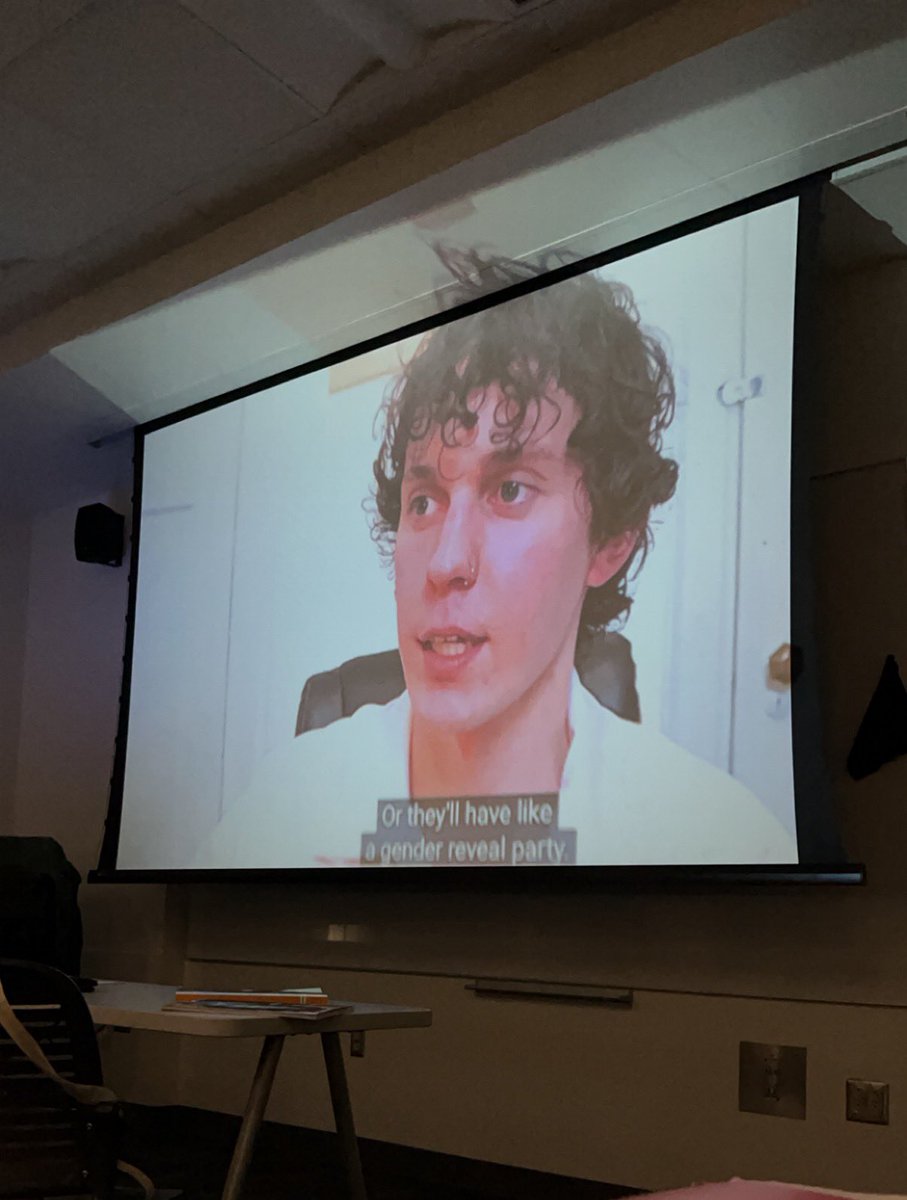 kurrrtis's tweet photo. celebrating kurtis and jenna’s wedding by projecting his face in the lecture hall @kurtisconner https://t.co/lyZr6iz64w