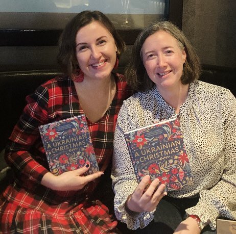 CathBurkeEditor's tweet photo. Never meet your heroes? They lied. Delighted to meet in person Nadiyka Gerbish, one of the authors of A Ukrainian Christmas, which we’re publishing on Nov 3rd. Very special to see this beautiful book featured on the @HachetteUK stand #FrankfurtBookFair #FBF22 https://t.co/uKc2wCGYuy