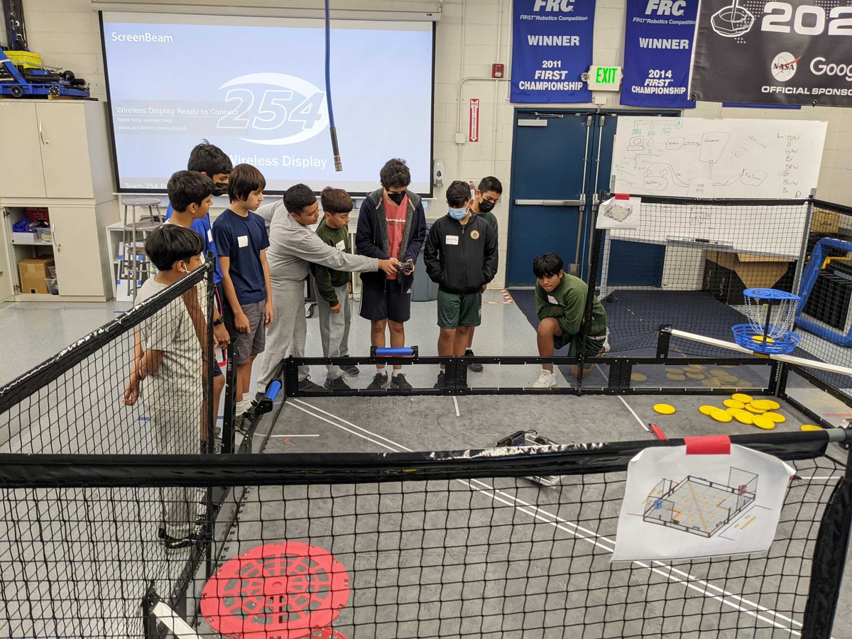 We had some guests from @shnativity and taught them about VEX robotics. We showed them how we build our robots. Then, they raced against each other with their own drive bases! We hope they enjoyed their time and will come back again! #gobells #team254