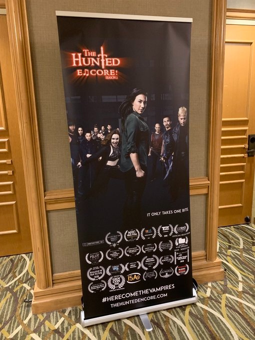 neddonovan's tweet photo. A little #throwbackthursday to the screeening of season 2 of #TheHuntedEncore at @gen_con !!🧛🏻♂️🧛🏻♀️
#HereComeTheVampires #madeinny #webseries #musicaltheatre #halloween #vampires #indiefilm #nyc #swords #badassfemalecharacters https://t.co/EbvcDiAcLG