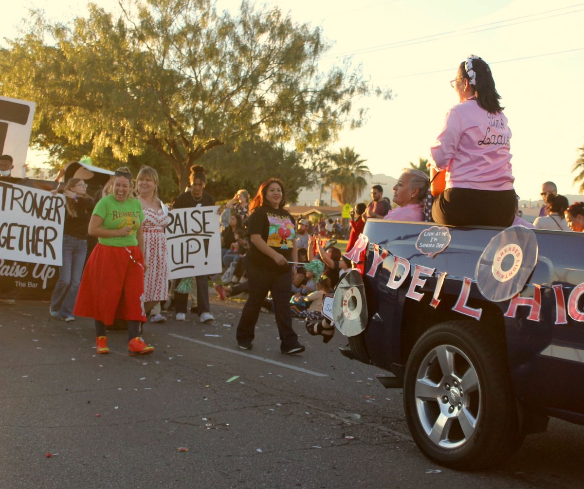 Ross_Journalism's tweet photo. The green and gold Rebels celebrate with the purple and gold Mustangs in the Burges Homecoming Parade. https://t.co/ldKwWRcDMt