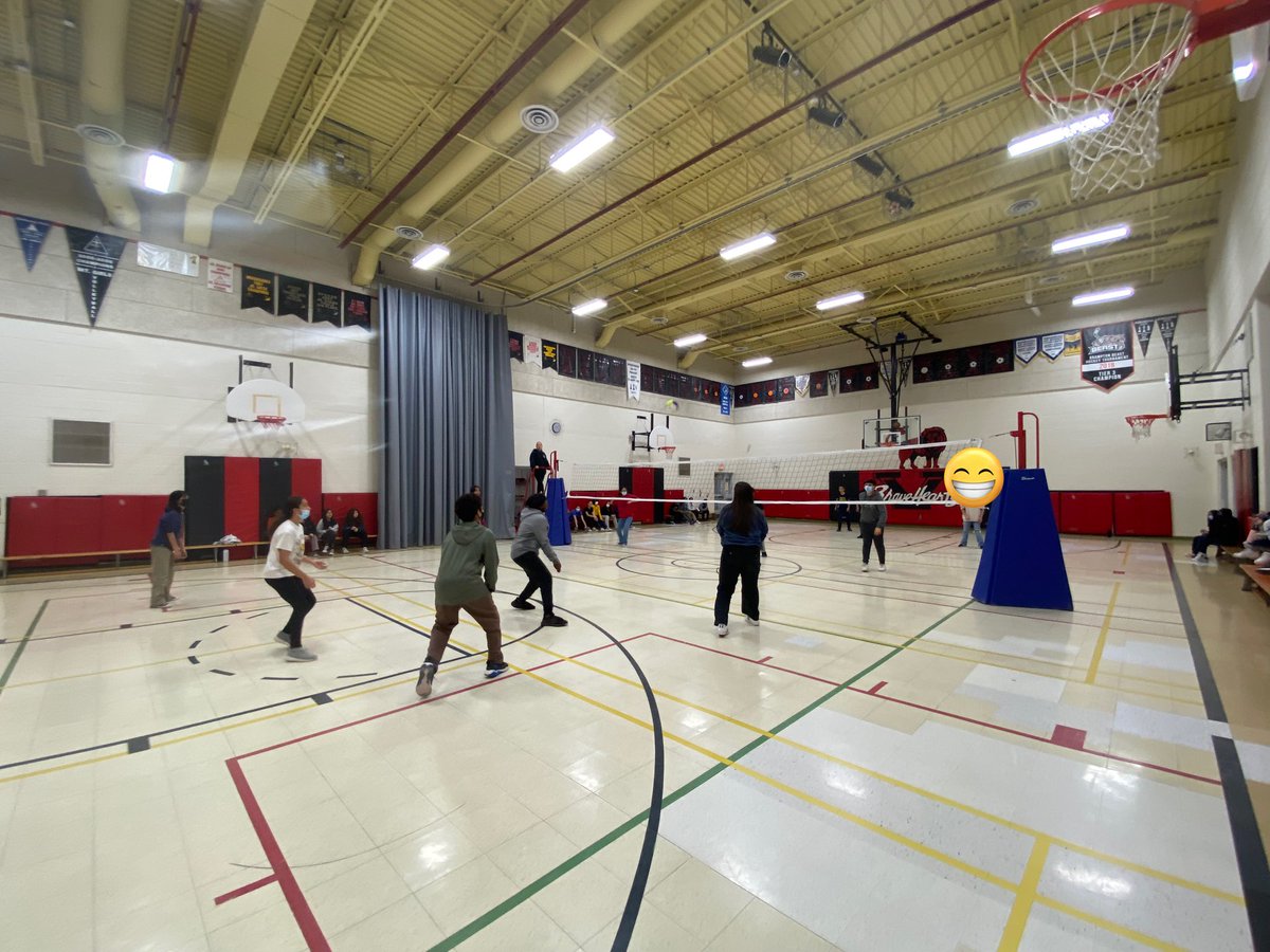 CoutoMr's tweet photo. Grade 8’s classes beating the rainy weather (and showing off their competitiveness) by facing off against each other in a friendly match of #volleyball. @ValentineDPCDSB https://t.co/2WZ0QXgCee